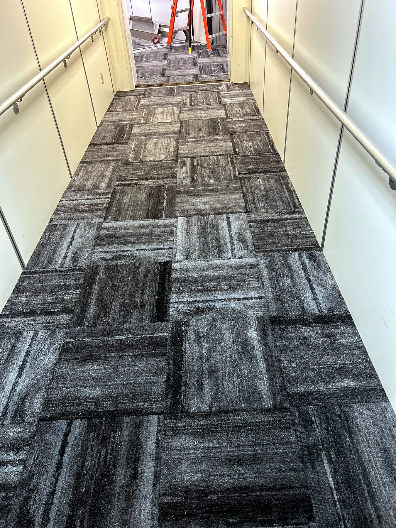 New carpet tile in an airport jet bridge