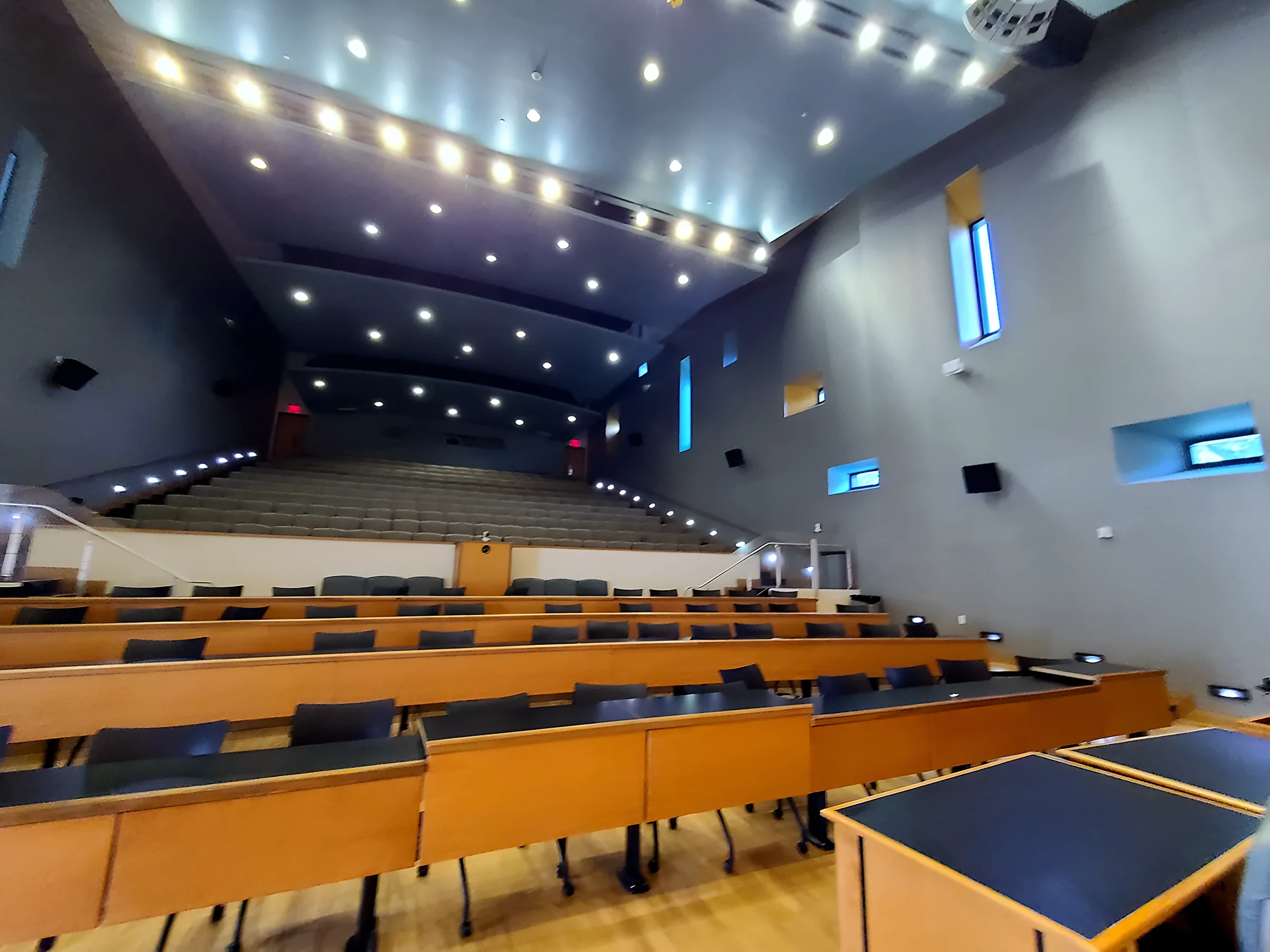 Rewrapped acoustic panels at the FIU auditorium