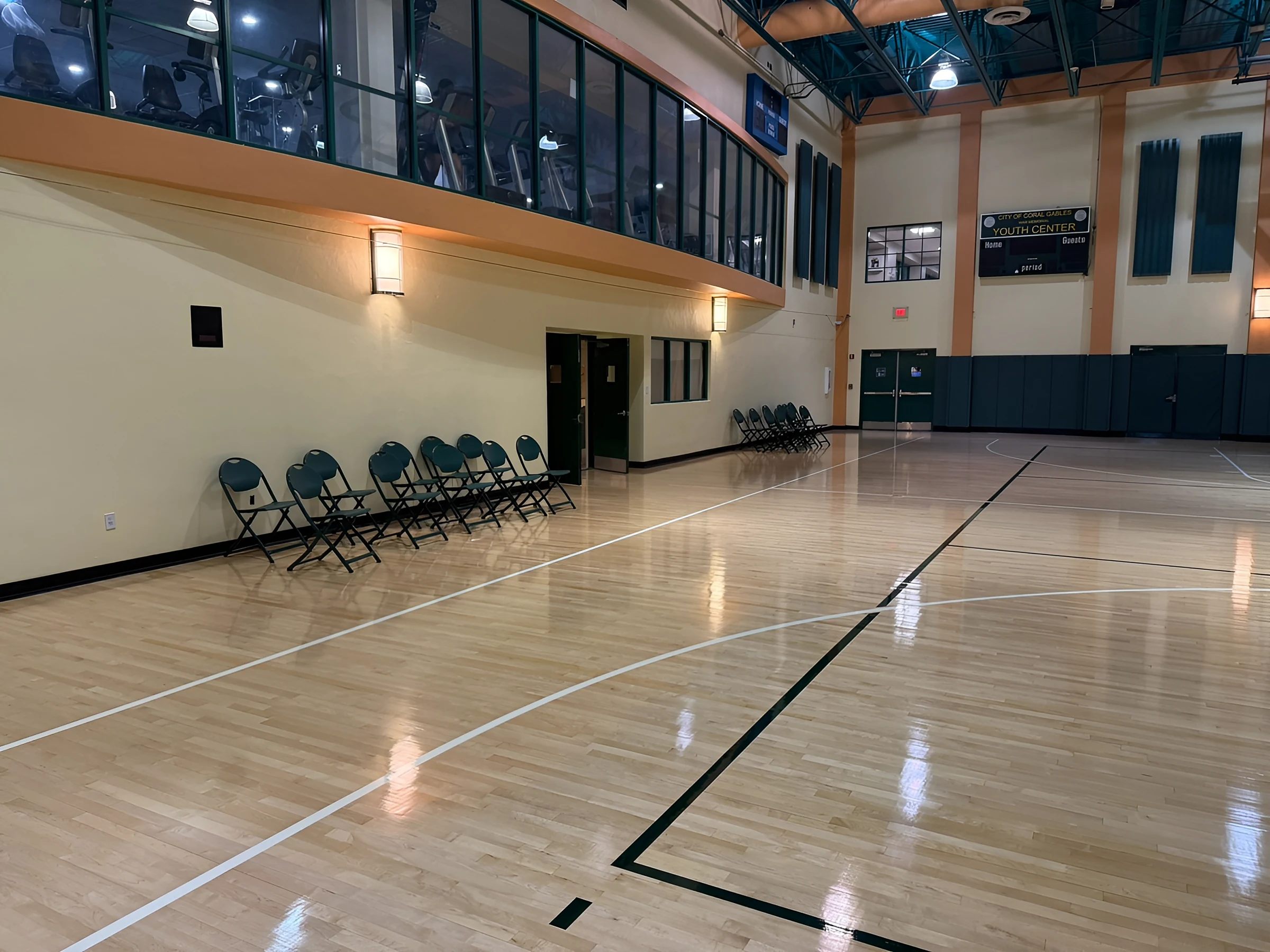Sideline under the viewing gallery, with new black and white game lines