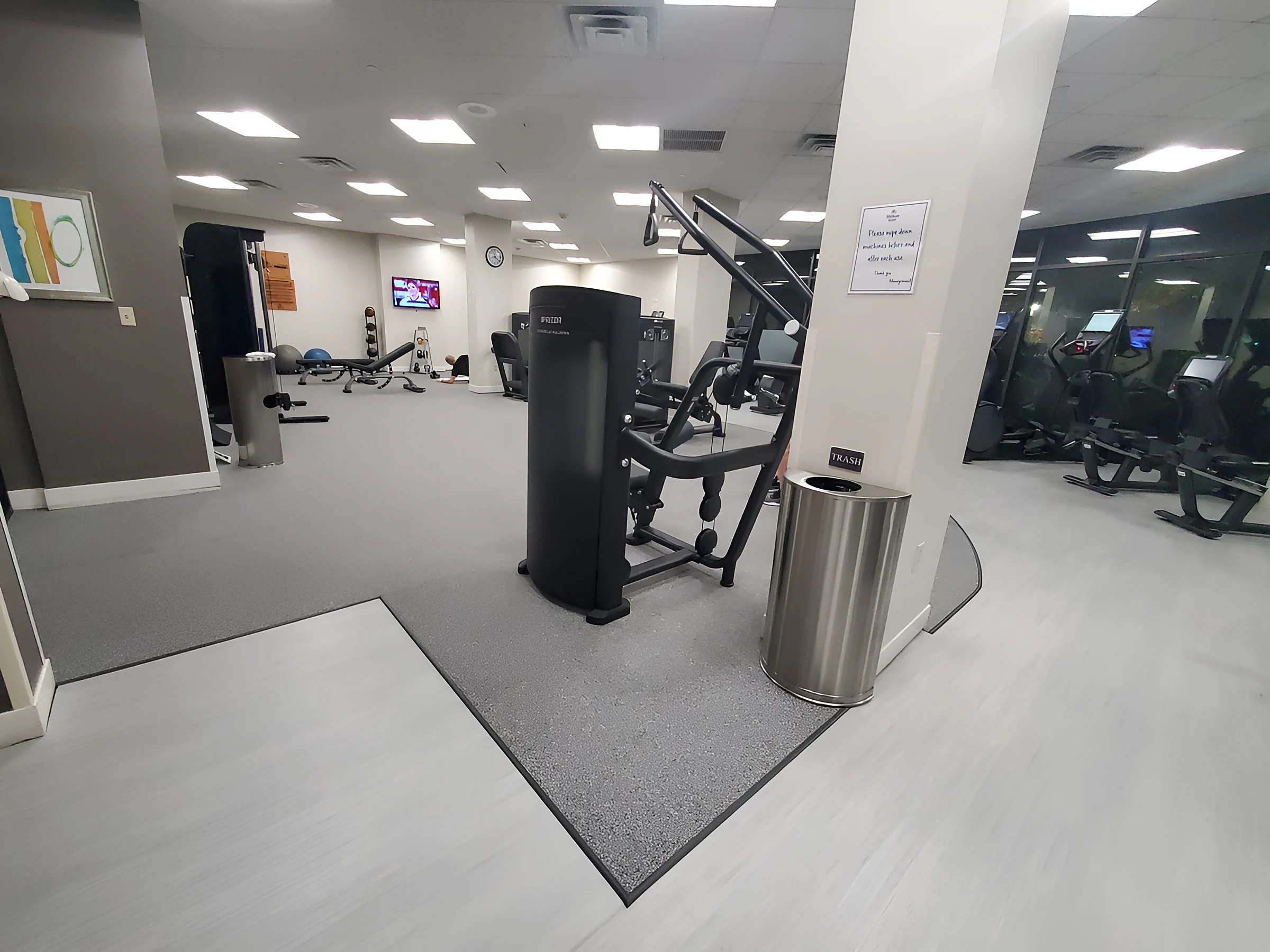 The free-weight area on rubber flooring