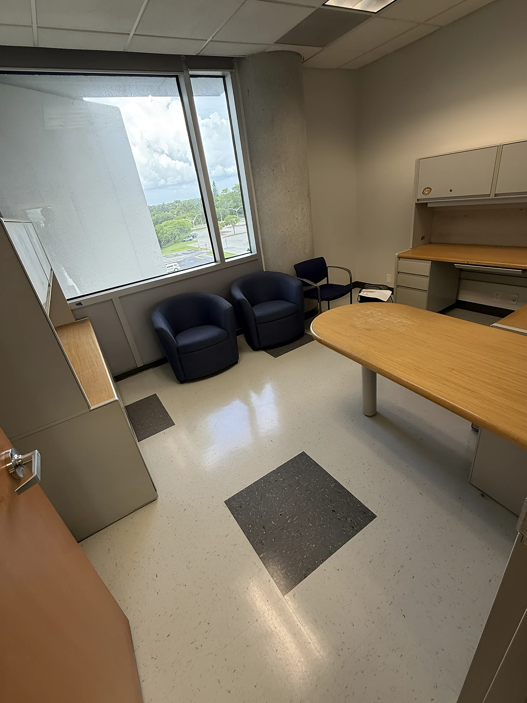 A faculty office with the new floor and paint