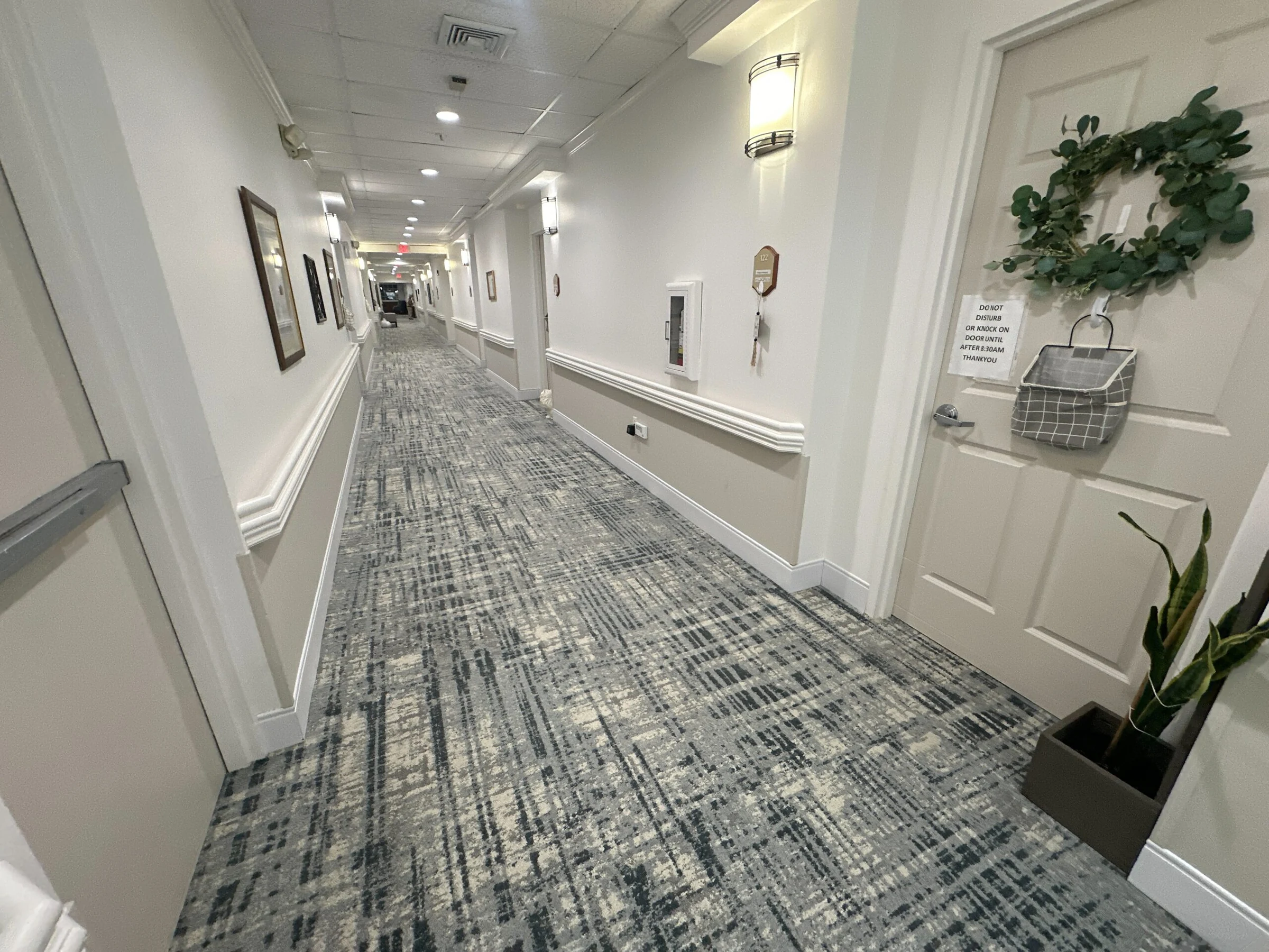 Corridor in patterned blue and grey carpet
