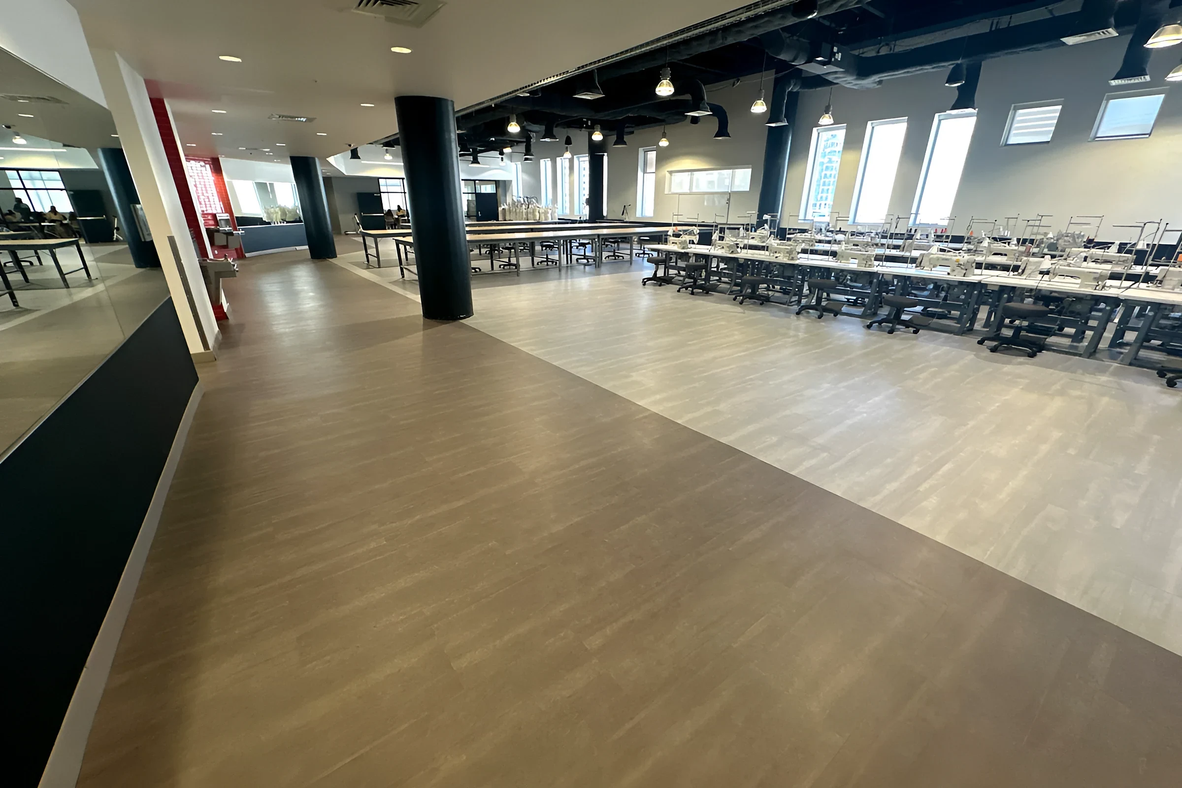 The fashion studio floor with the two-tone LVT layout