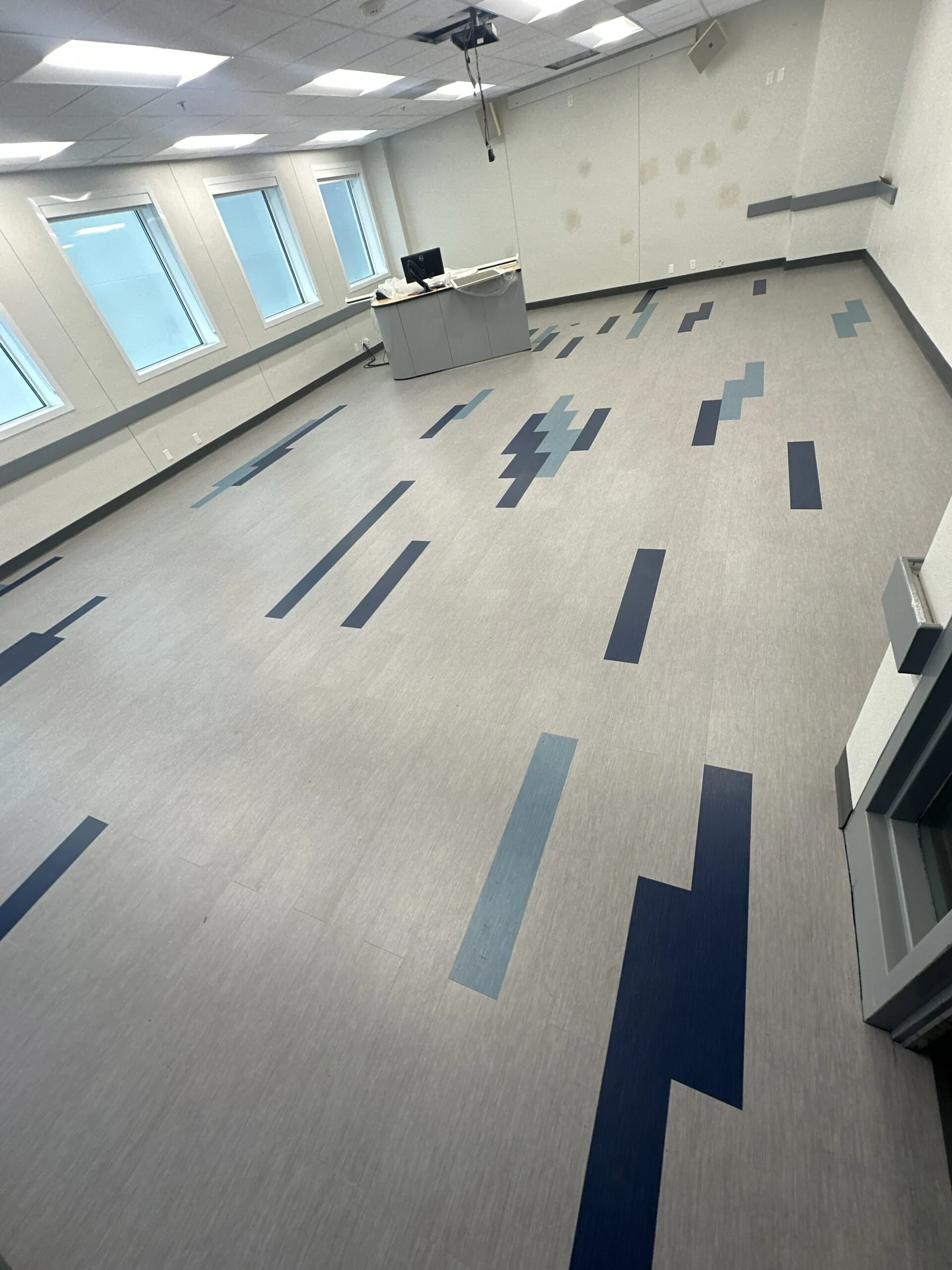 The pattern running the length of a classroom