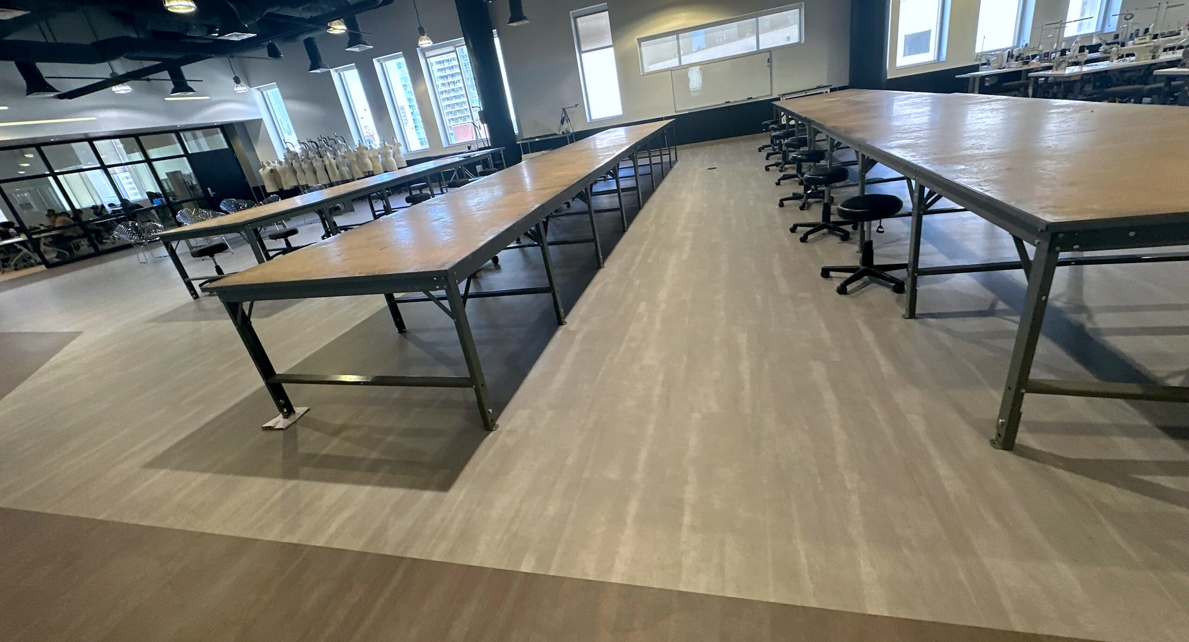 Two-tone vinyl running beneath the cutting tables in the MDC Wolfson fashion studio
