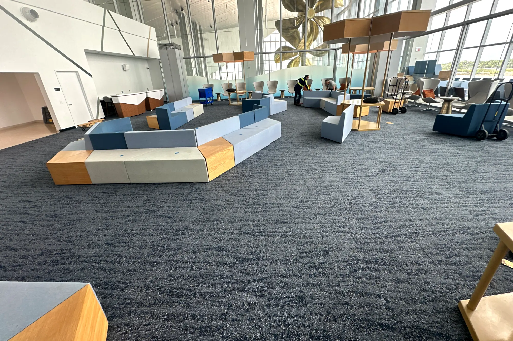 The suite lounge seating area under the sculptural ceiling